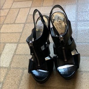 Carlos Santana black heels